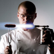Illustration for article titled Bonkers British Chef Slices Cucumber with Samurai Knife Taped to Powersliding BMW M5